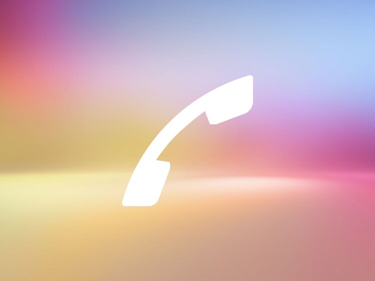 Telefonhörer Icon vor bunten Hintergrund.