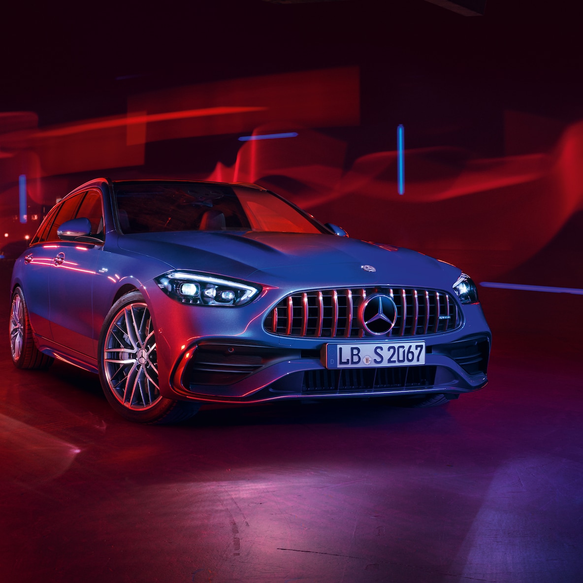 Mercedes-AMG C 43 in the front view against a red background