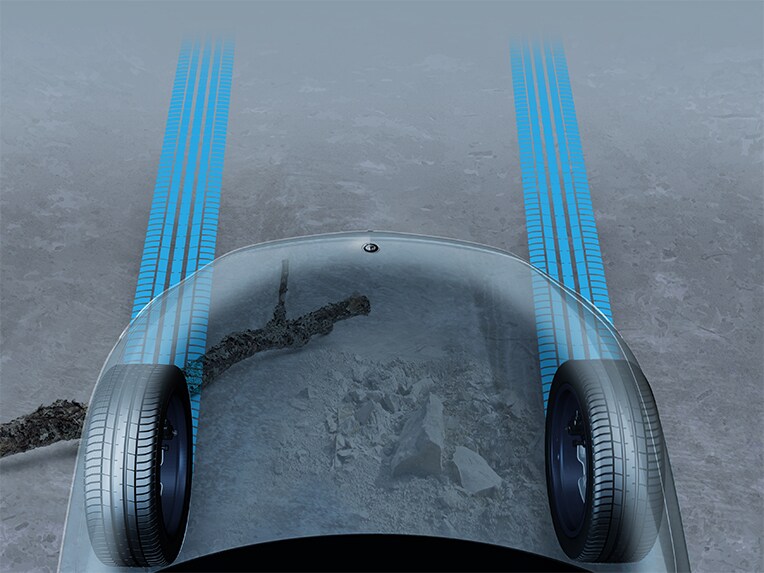 Eine grafische Darstellung der transparenten Motorhaube des EQE SUV von Mercedes-Benz.