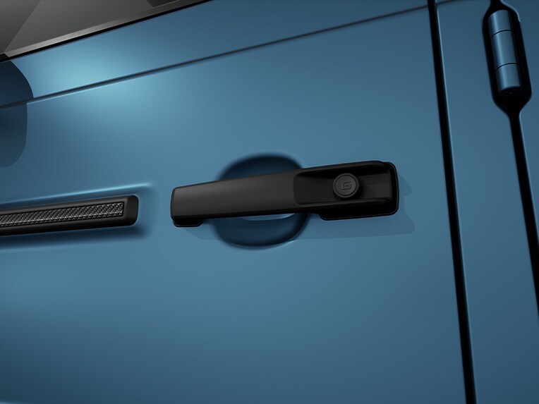 Das MANUFAKTUR Logo-Paket in Schwarz der Mercedes-Benz G-Klasse.
