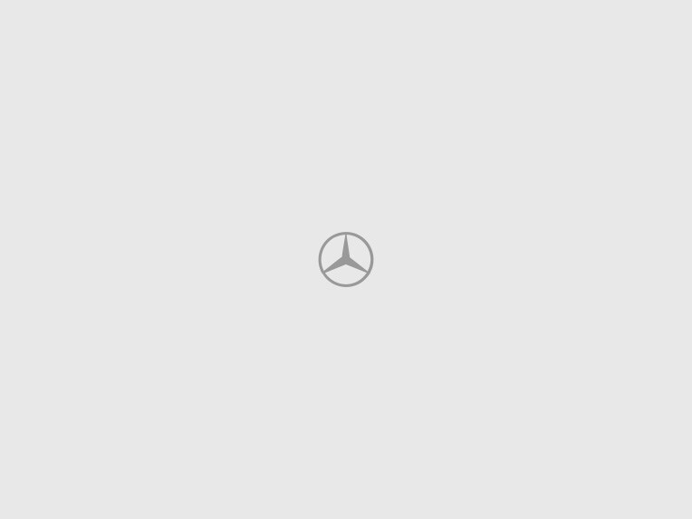 Ein hellgrauer Hintergrund mit einem dunkelgrauen Mercedes-Benz Stern in der Mitte.