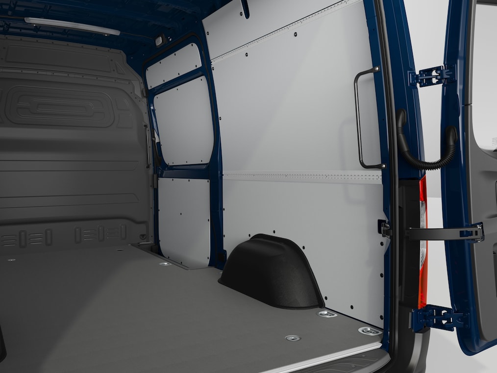 Der Laderaum des Mercedes-Benz eSprinter Kastenwagens mit grauem Boden und weißen Wänden.