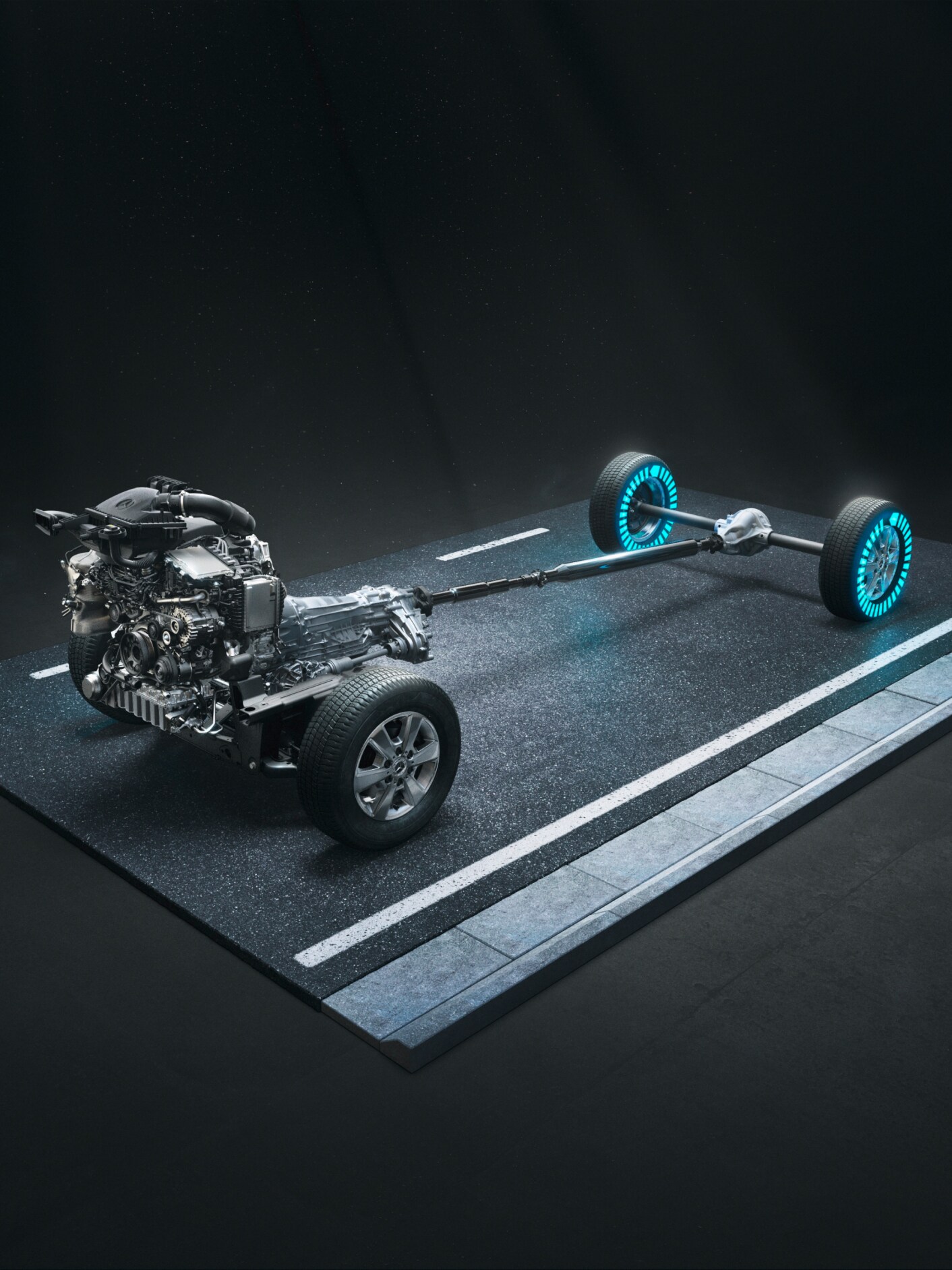 Der Antriebsstrang mit Allradantrieb 4x4 und mit Torque-on-Demand des Sprinter in einer schwarzen Studioumgebung.