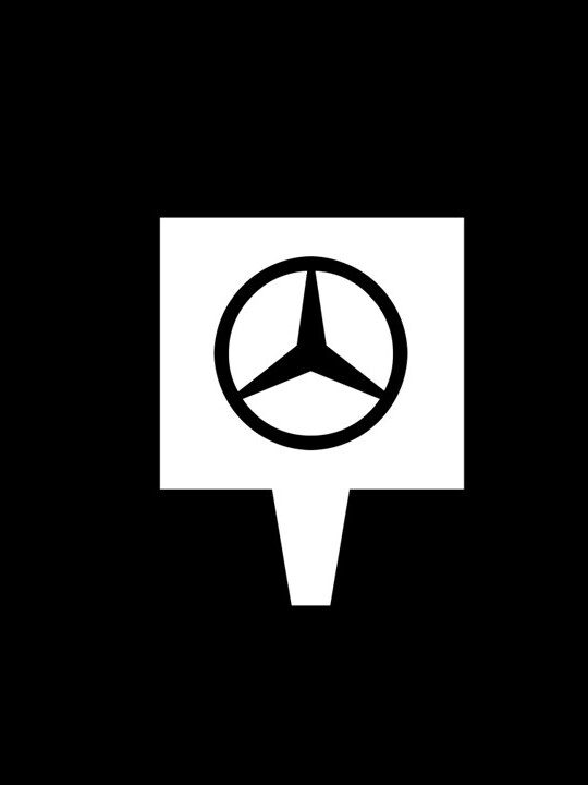 ein weißes Ortungs-Icon mit einem Stern vor schwarzem Hintergrund